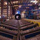 view of the rollers for pipes inside shop
