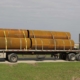 large pipes on a flat bed truck