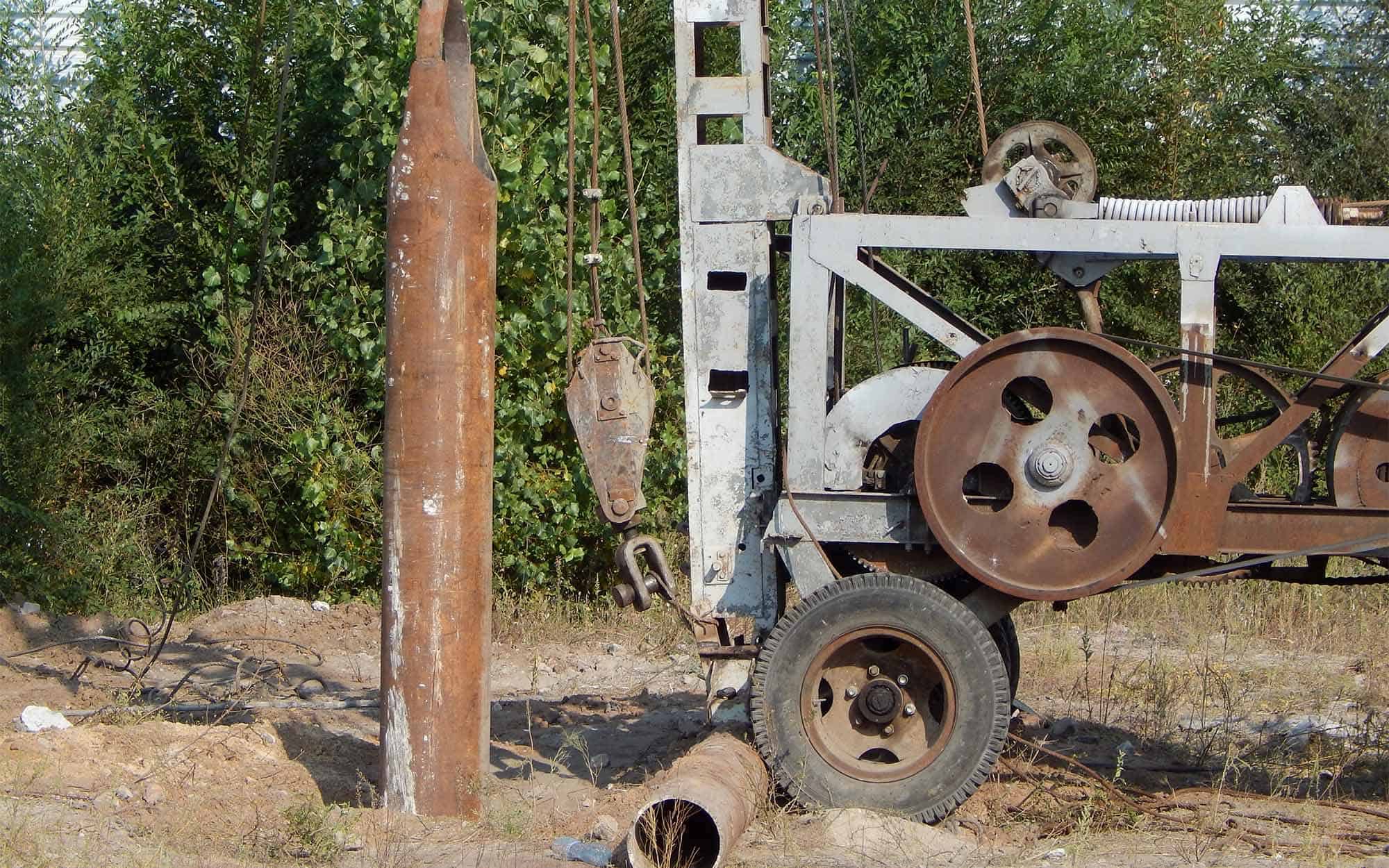 Water well rig installing water well casing pipe Pittsburgh Pipe