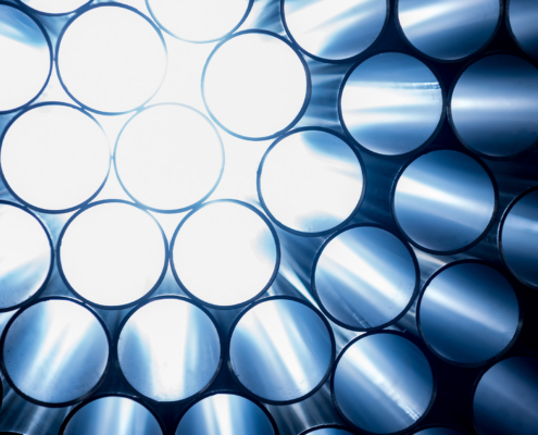Abstract background of steel pipes stacked on a pallet